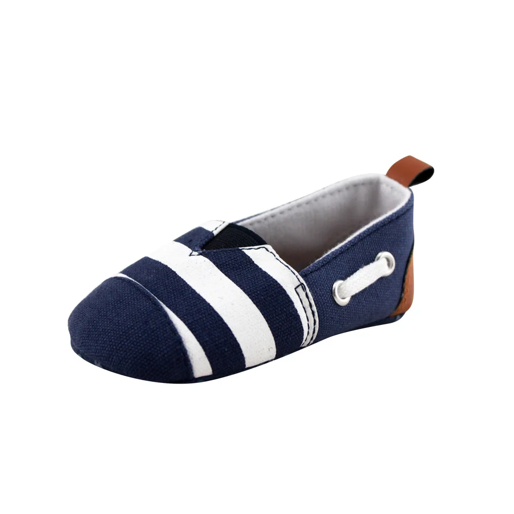 white canvas baby shoes