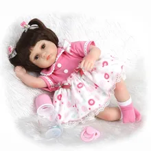 Muñeca reborn de 40 cm con vestido rosa