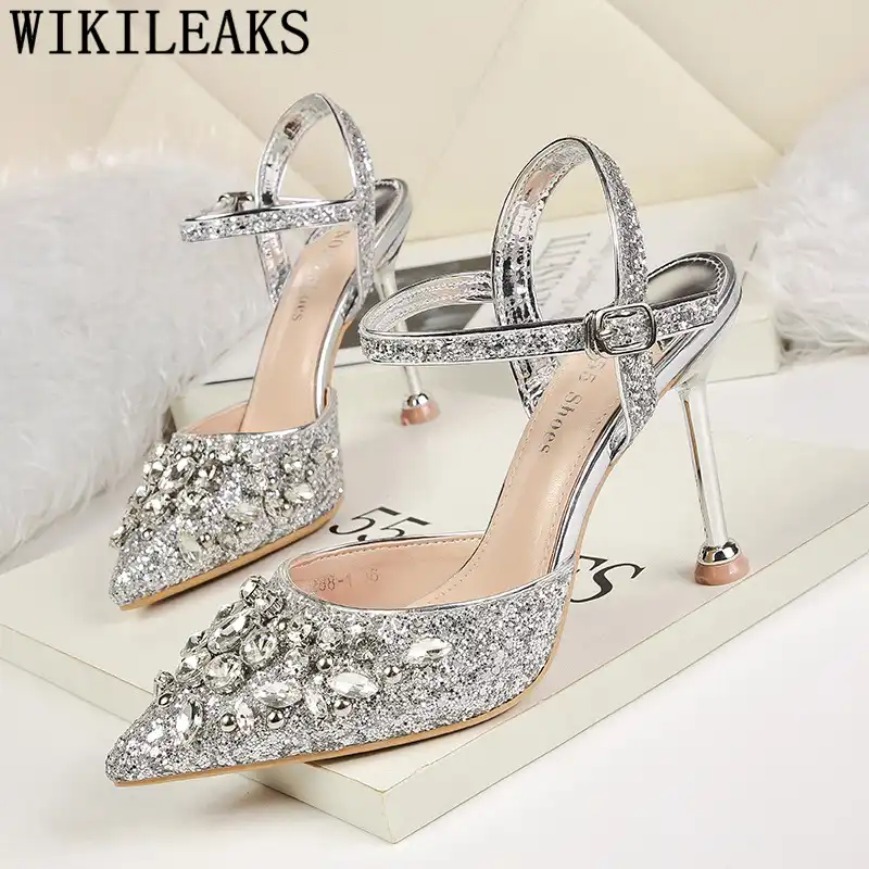 black pumps with gold heels