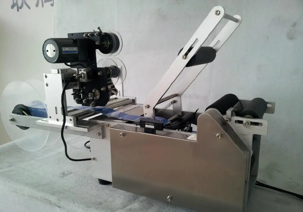 

2016 Manual coding one semi-automatic labeling round bottle Labeling Machine round can labeling machine
