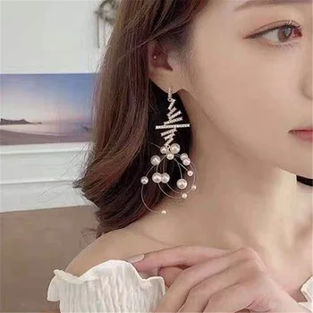 

Dominated The new long pearl tassel earrings individuality creative web celebrity crystal Women Drop earrings Jewelry