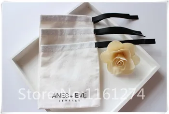 

Customized white cotton bag with black logo and black ribbon Jewelry gift pouch Free Shipping