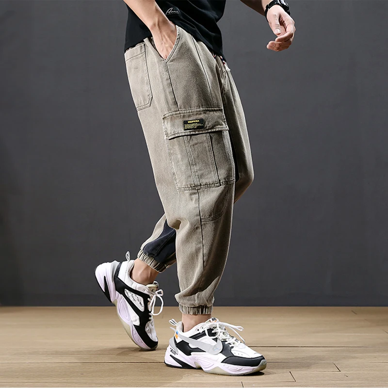Japanese Style Fashion Men Jeans Loose Big Pocket Cargo Pants Stripe Spliced Harem Pants Streetwear Hip Hop Slack Bottom Joggers Japanese Style Fashion Men Jeans Loose Big Pocket Cargo Pants Stripe Spliced Harem Pants Streetwear Hip Hop Slack Bottom Joggers