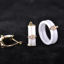 Blucome Anillo Pendientes Sistemas de La Joyería de Cobre De Cerámica Blanca Princesa Aretes de diamantes de Imitación de Circón Ganchos Dos Anillos Con Caja de Regalo