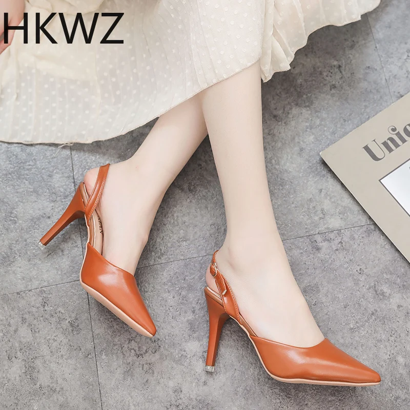 

Brand new patent leather word buckle with hollow single shoes pointed high heels simple stiletto banquet party sexy sandals