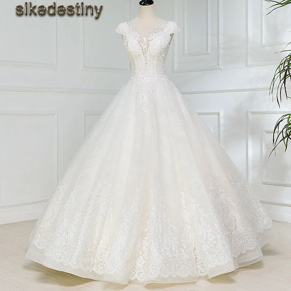 Elegant Fluffy Backless Wedding Dresses With Lace Appliques Cap Sleeves