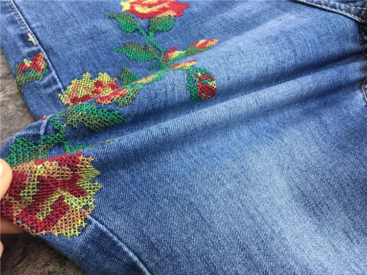 2017 European and American women's high waist elastic front and rear side of the cross embroidery roses washed cat to be cowboy pants pants pants (28)