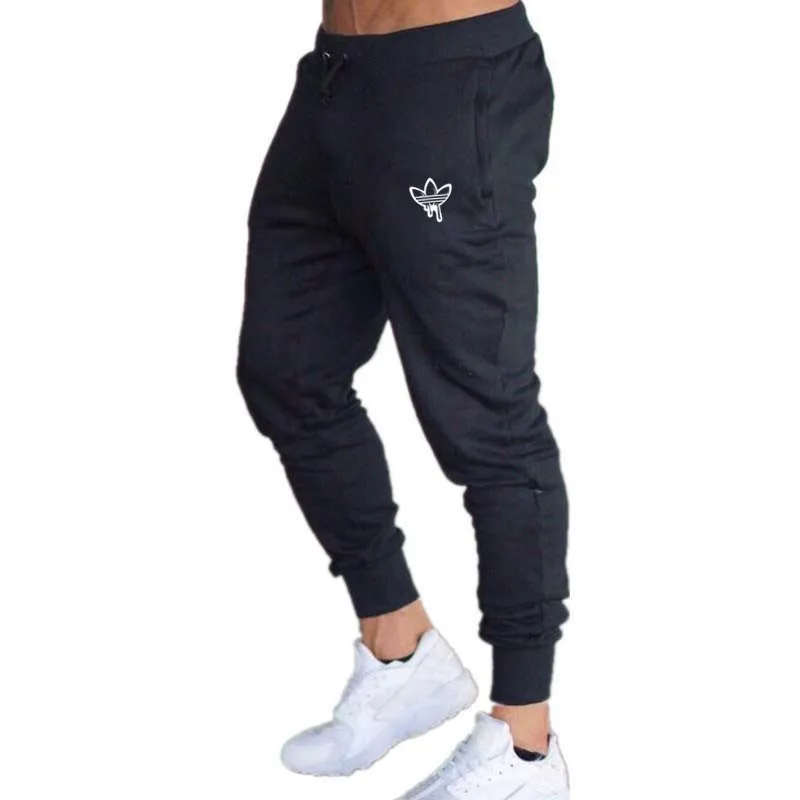 2018 новые осенние Для мужчин черный каракули печати брюки джоггеры Для Мужчин's Штаны Повседневное Slim Fit Для Мужчин's Фитнес пот штаны большой