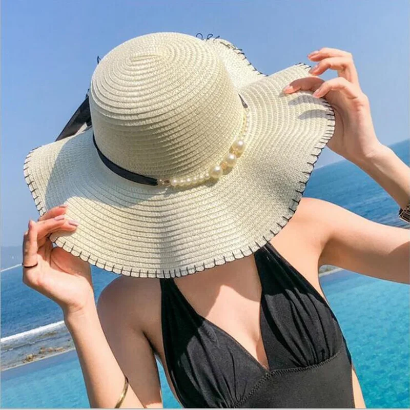

2017 New Spring and Summer Woman and Child Leisure Pearl Beach Sun Hat Parent-child Sunscreen Big Wavy Straw Hat