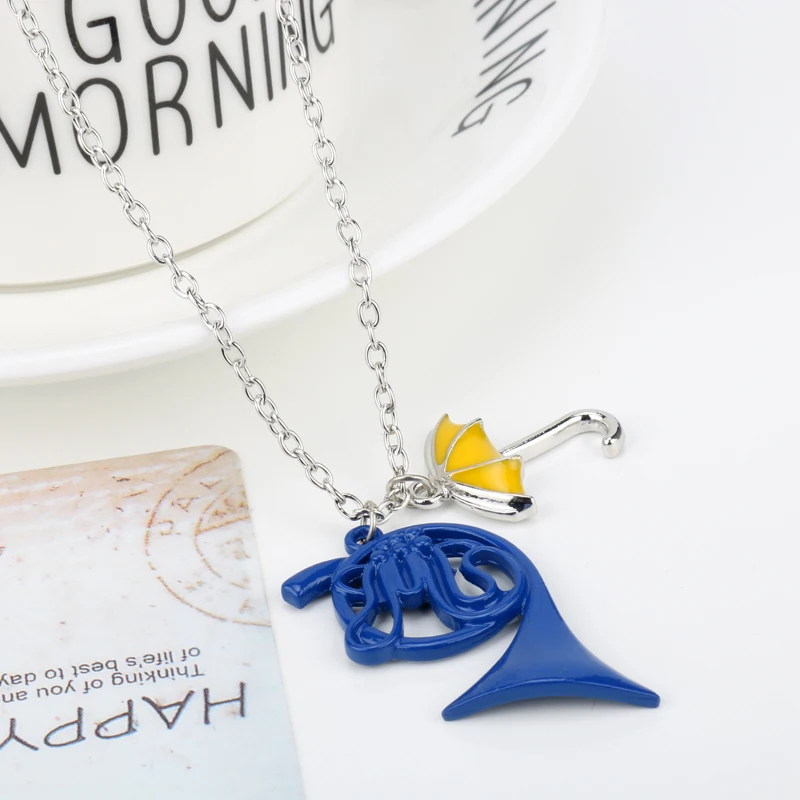 

HANCHANG New Jewelry How I Met Your Mother Necklace with Blue French Horn/Yellow Umbrella Pendant HIMYM TV Cosplay Necklace Gift