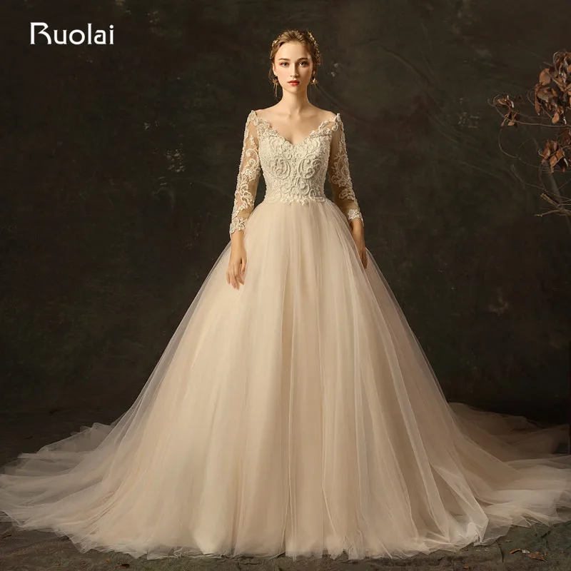 

Elegant Wedding Dresses Long Sleeve 2019 Off the Shoulder Wedding Gown V Neck Beaded Lace Bridal Gown Vestido de Casamento RW29