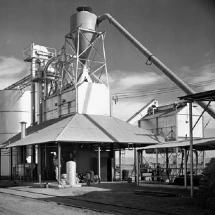 Grain elevator in a field Poster Print (24 x 36)