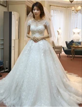 Charming Ball Gown Wedding Dress Short Sleeve Scoop Neck Appliques Chapel Train Sheer Vestido De Noiva NM 749