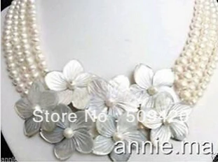 

Free shipping >>@ +>4 row 6-7mm white freshwater pearl shell flower necklace