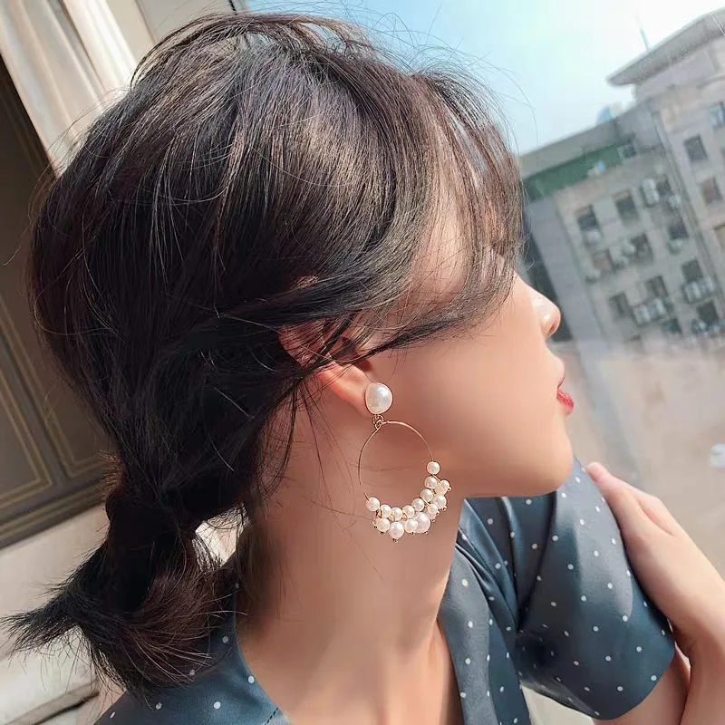 

Best Selling Simple Temperament Imitation Pearl Metal Big Circle Hollow Earrings Earrings Female Sweet Wild Wedding Earrings
