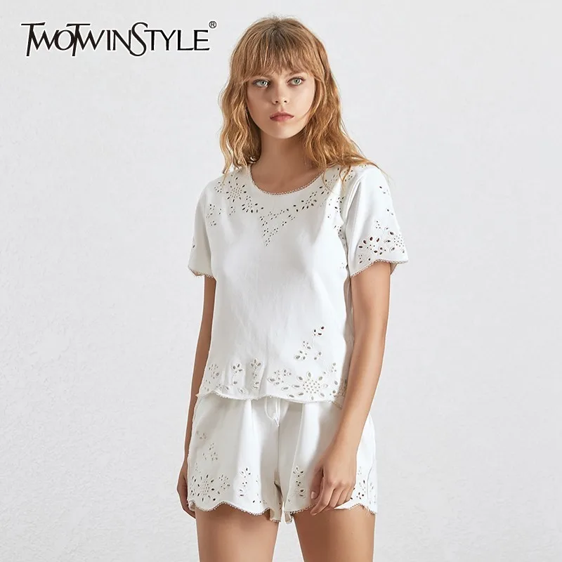 

TWOTWINSTYLE Summer Hollow Out Two Piece Set For Women O Neck Short Sleeve Tops High Waist Lace Up Shorts Female Suit 2019