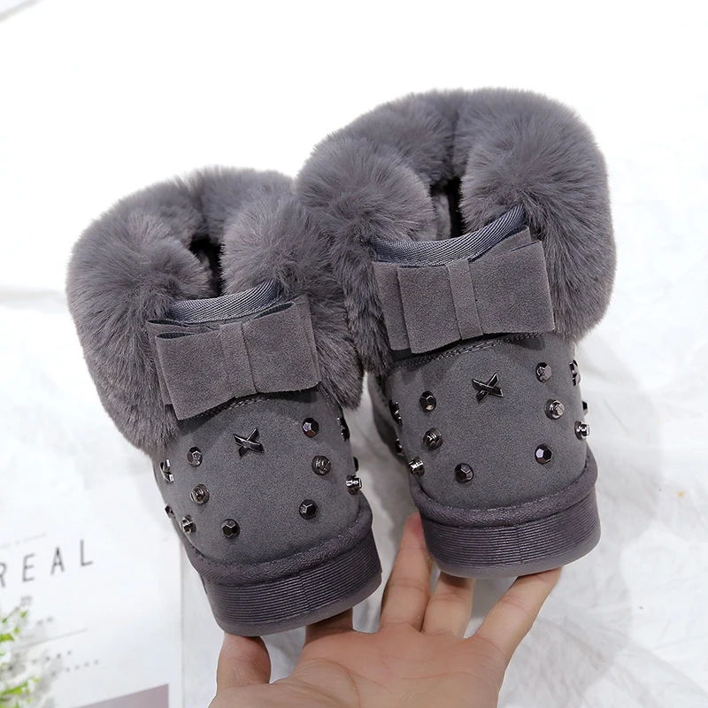 Tanie Styl moda grube futro kobiet śnieg buty okrągłe Toe wodoodporne kobiece płaskie wysokie góry buty zimowe szycia śnieg buty
