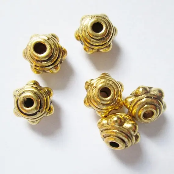 14 pcs Antique Gold Tone Base Metal Beads, Spacers 7 mm x 5.5 mm, Lead