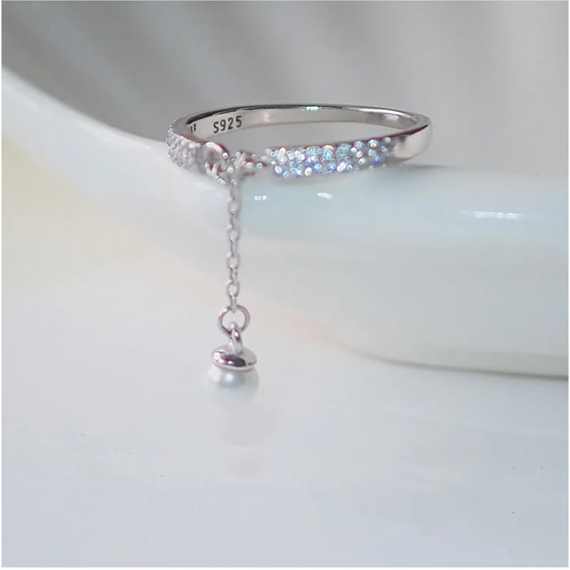 

anenjery Micro Zircon 925 Sterling Silver Rings Simulated Pearl Chain Tassel Adjustable Rings For Women anillos Bague S-R334