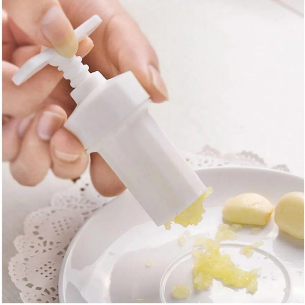 

New Kitchen Ginger Garlic Manual Press Twist Cutter Crusher Cooking Tool Plastic Garlic presses Blenders peeler Free shipping