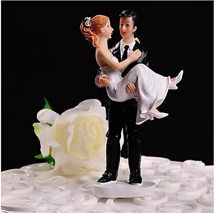 

Swept Up in His Arms Wedding Cake Toppers Couple Figurine Bride and Groom for cake decorations