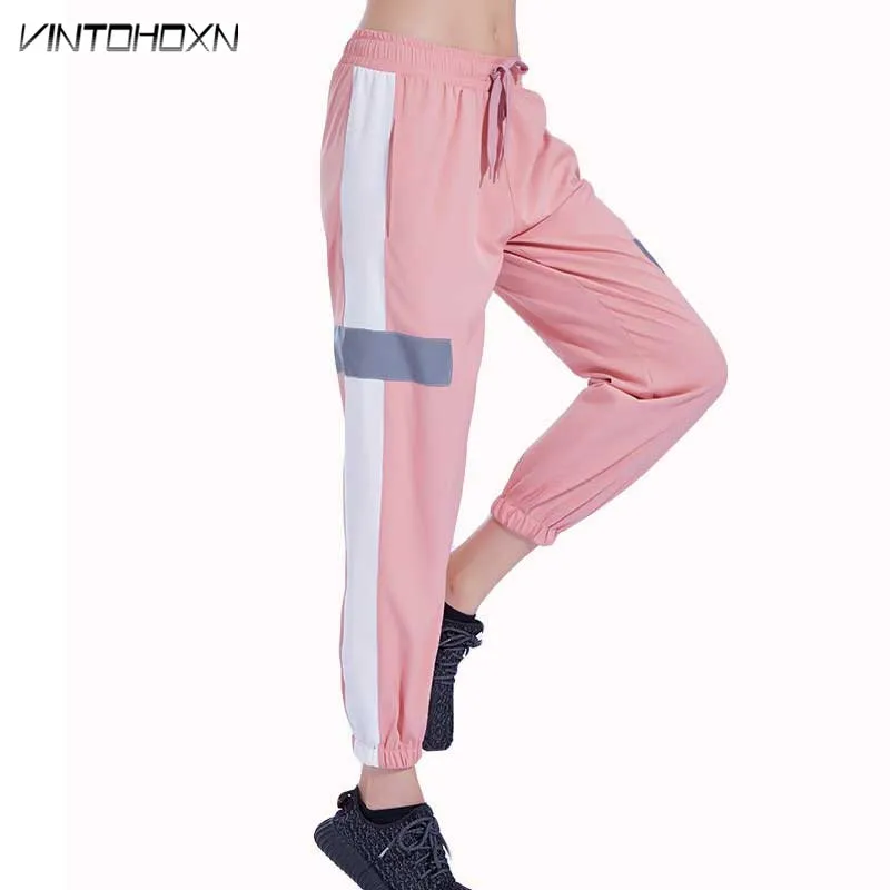 المرأة الرياضية ضغط تشغيل سراويل رياضية اليوغا ممارسة اللياقة البدنية Sweatpants تجريب المرأة فضفاض المشي السراويل الملابس 18207