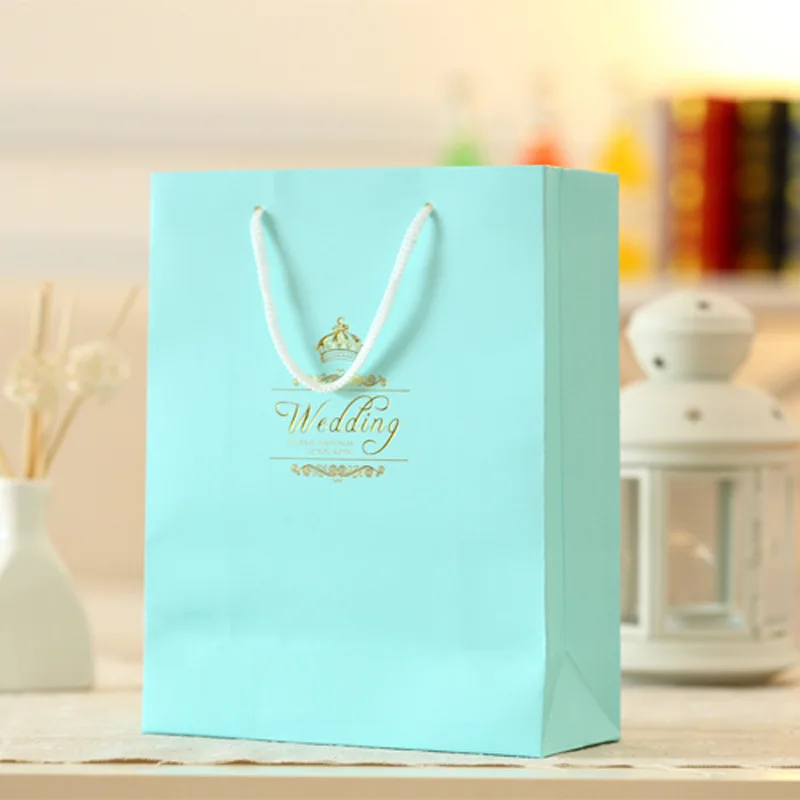 50pcs Lot Wedding Paper Gift Bags With Handles Favors For 50pcs Lot Wedding Paper Gift Bags With Handles Favors For Guests Pink Purple Blue Printing Candy Bo Party In Wring Supplies