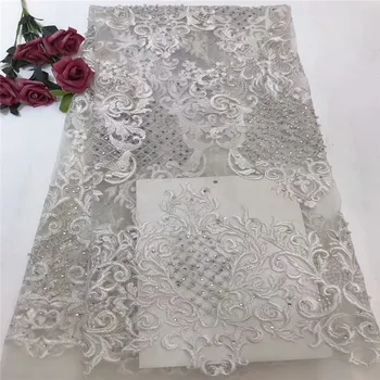 

2018 Beautiful White 3d lace fabric with beads 3d flower embroidered lace trim French tulle net lace fabric for wedding ls65-994