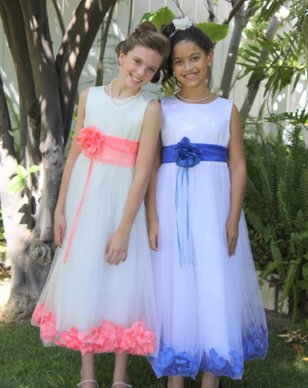 flower girl dresses with rose petals in them