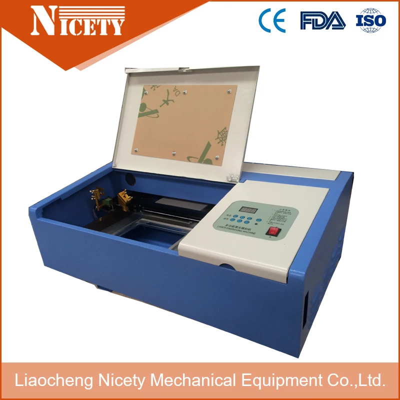 Buy 300*200mm up and down working table wood pen laser