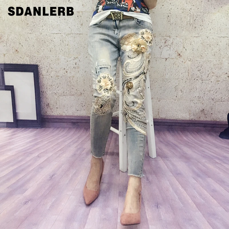 

Europe Style Jeans Woman Spring New Heavy Industry Embroidery Flower Bronzing Sequins Nine Minute Small Leg Jeans Pencil Pants