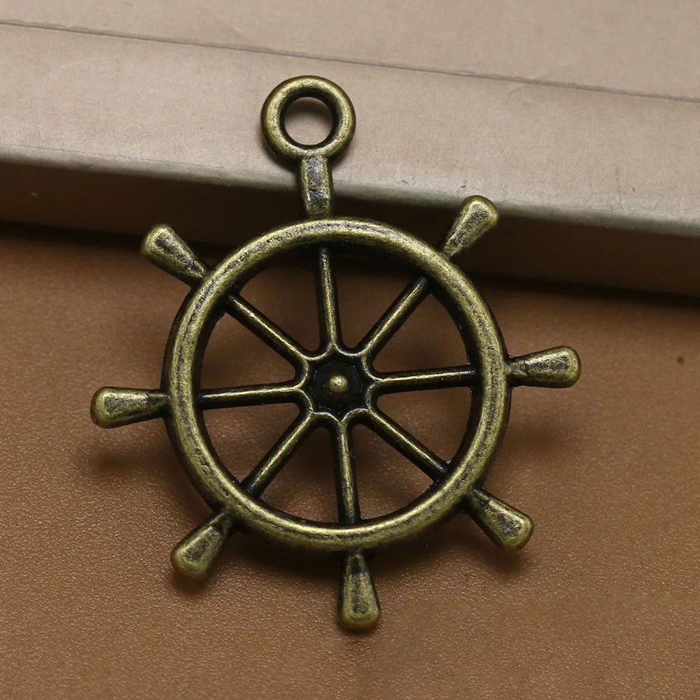

ANGRLY 50pcs 29*25mm Have Hook Up Retro Zinc Alloy Handmade Accessories Double-sided Rudder Metal Pendant Ship Pirate Decoration