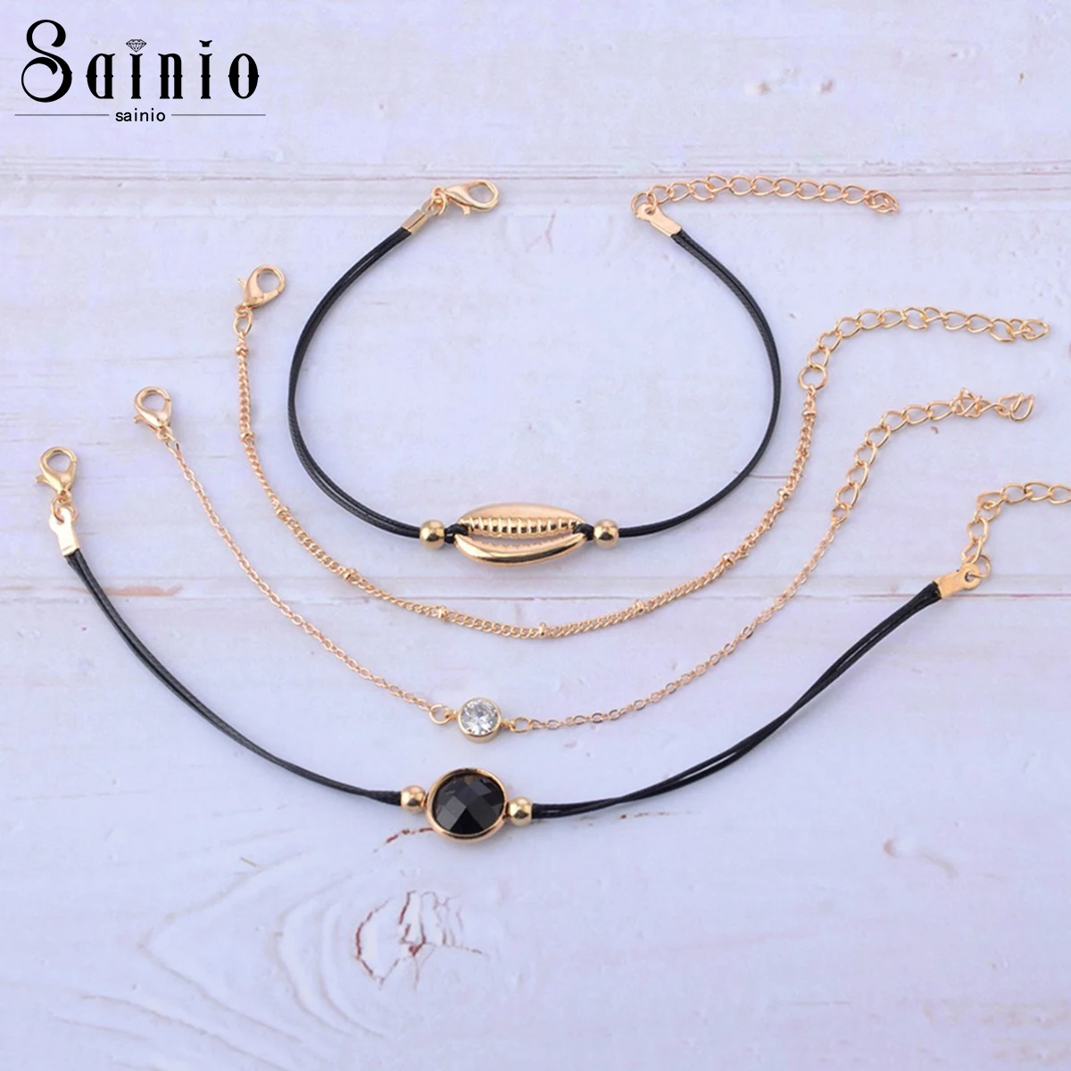 

New Design Women Bohemia Chain Bracelet Set Sea Shell Crystal Black Bead Charm Bracelets Set 2019 Summer Beach Jewelry 4pcs/set