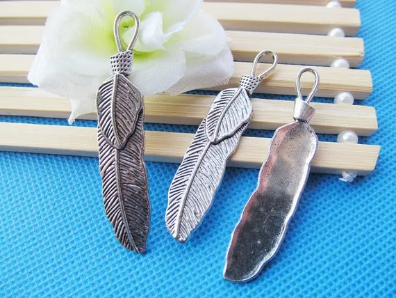 

50 шт., винтажные подвески в виде перьев