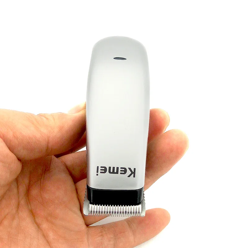 Kemei portátil elétrica máquina de cortar cabelo