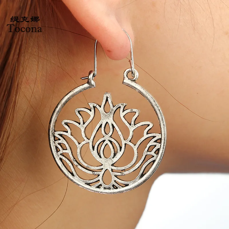

Tocona Vintage Tribal Hollow Circle Lotus Flower Drop Earrings for Women Punk Silver Alloy Piercing Dangle Earrings Jewelry 4900