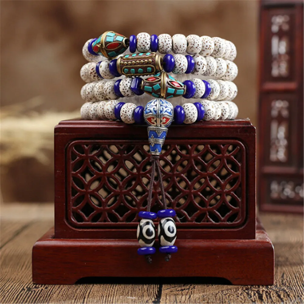 

Hainan Natural Star Moon Bodhi Beads 108 Mala Nepal Copper Charm High Density Dry Milling Star-Moon Buddhist Prayer Bracelets