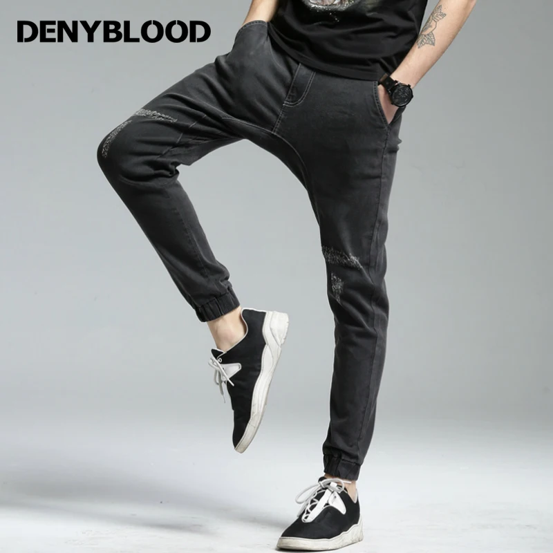 black jeans ripped at bottom