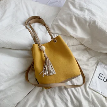 

Summer female handbag fashion retro tassel canvas bucket bag solid color casual wild bag hand bag shoulder diagonal package
