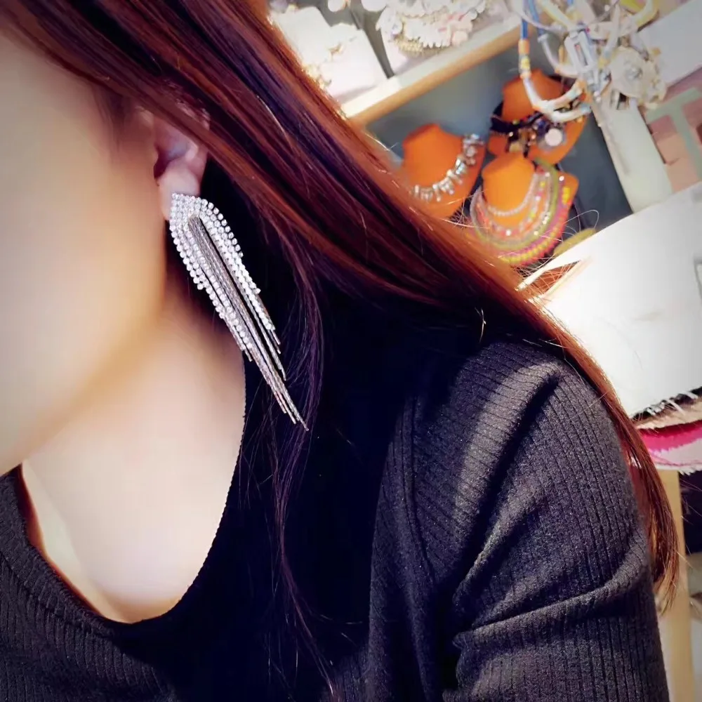 

Gold and silver tassel pendant drop earrings
