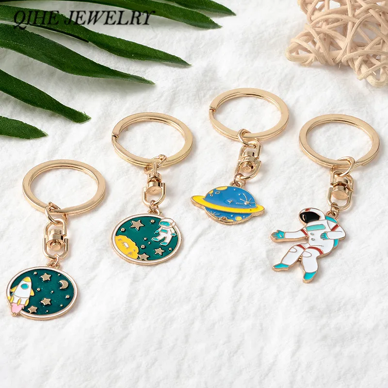 

QIHE JEWELRY Astronaut Key Chains Space Travel Collection Keychain Planet Star Galaxy Keyring Key Charm Gift for Space lover