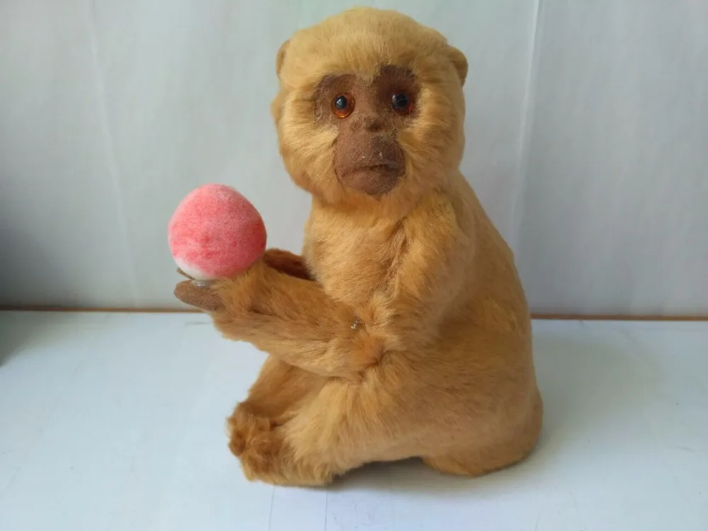simulation monkey 14x10x17cm plastic&furs taking peach monkey model