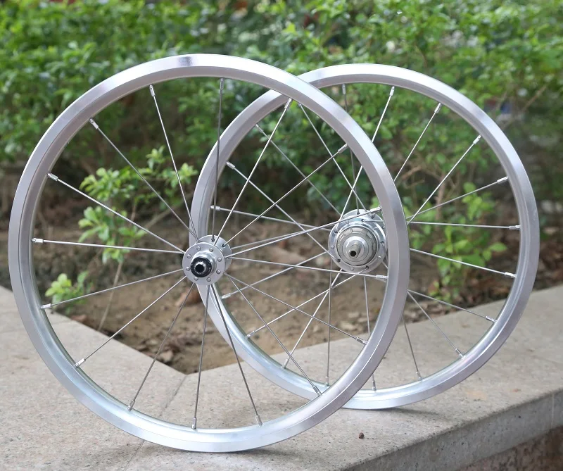 Цена за НОВЫЙ 16x1 3/8 "(349) серебро 2 скорости Колесная легкий вес Brompton 16/20 отверстие Цена за НОВЫЙ 16x1 3/8 "(349) серебро 2 скорости Колесная легкий вес Brompton 16/20 отверстие