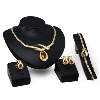 

Fashion Charm Four Piece Set Gold Big Crystal Water Drop Women Ladies Necklace Earrings Bracelet Ring Wedding Jewelry Gifts