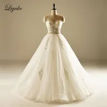 Glamorous Tulle Ball Gown Wedding Dress Strapless Neckline Beading Appliques Lace Court Train Ball Gown Bridal Dress