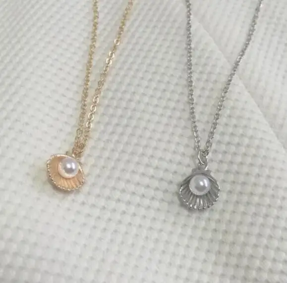 

Summer Beach Jewelry New Listing Fashion Bohemian Alloy Shell Imitation Pearl moon Pendant Female Necklace Sweater Chain