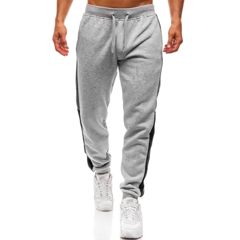 

2018 Foreign trade hot casual sports pants trousers stitching design large size sports trousers men jogger