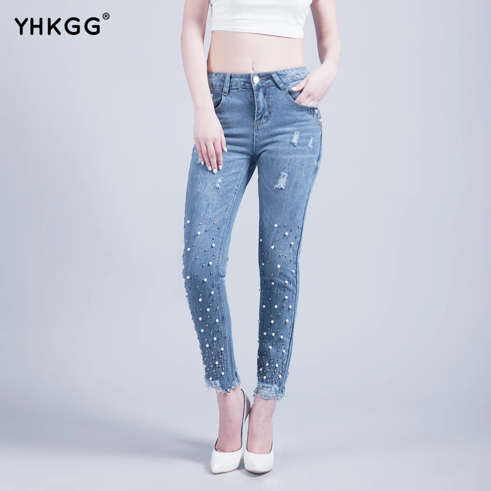jeans with pearls on the bottom