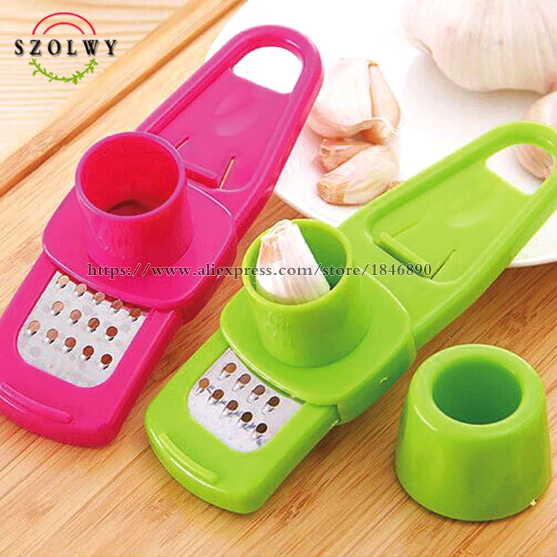 

new Creative garlic press Tool Multi Functional peeling machine Gringer crusher kitchen accessories random color