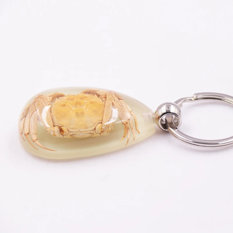 High quality Innovative design crab transparent tear drop resin luminous key ring chain